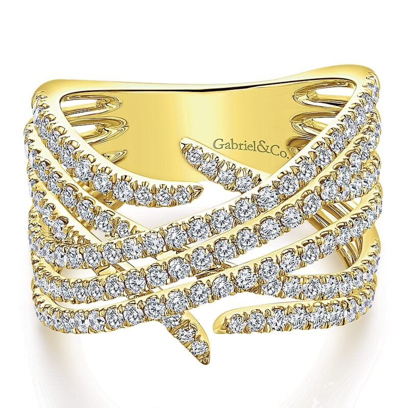 Elegant gold ring with crisscrossing diamond bands.