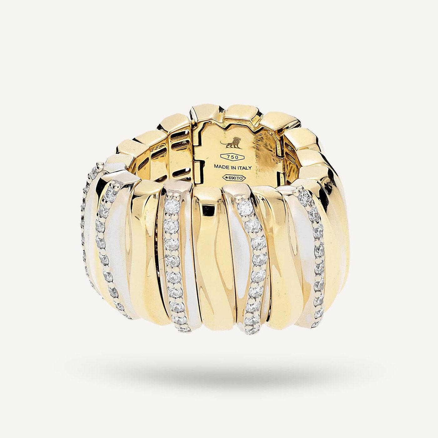 Elegant gold and diamond ring with multiple bands.