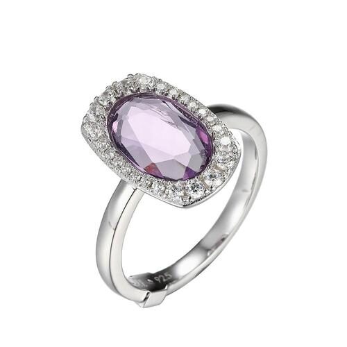 Elegant silver ring with a purple gemstone and small surrounding diamonds.