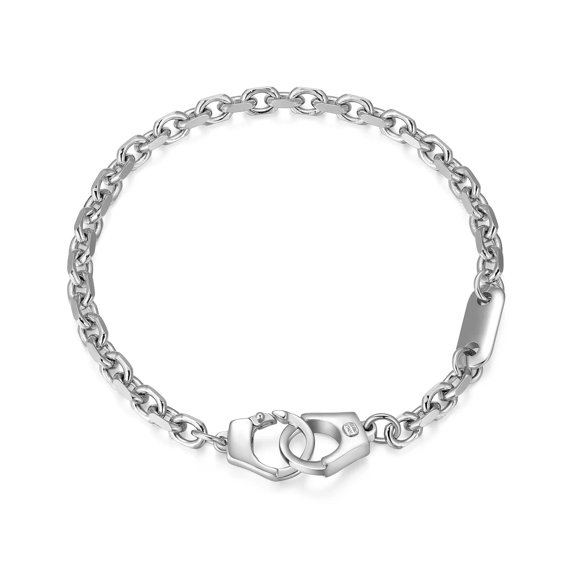 Elegant silver chain bracelet with a unique clasp design.