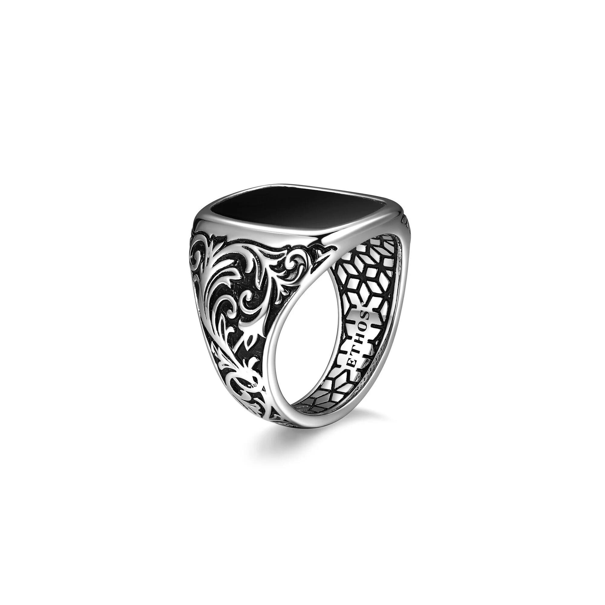 Elegant silver signet ring with intricate floral and vine details.