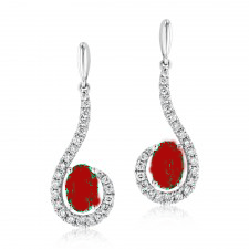 Elegant silver earrings with red stones and clear crystals.