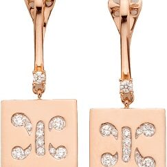 Rose gold butterfly-shaped earrings with sparkling stones.