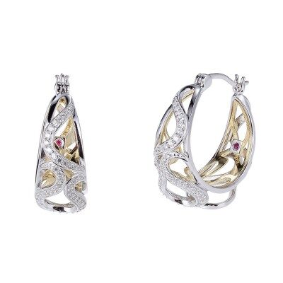Elegant silver and gold hoop earrings with intricate cut-out designs.