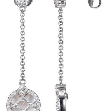 Elegant silver earrings with intricate designs and a dangling chain.