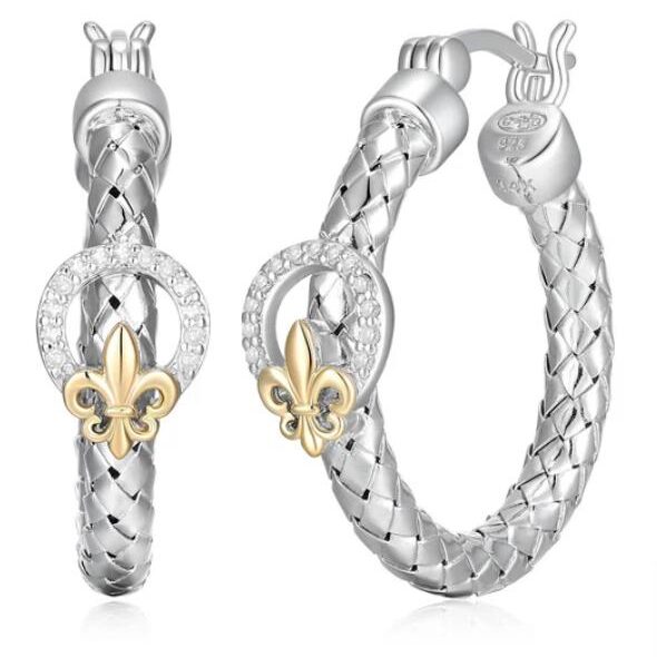 Silver hoop earrings with intricate detailing and gold fleur-de-lis accents.