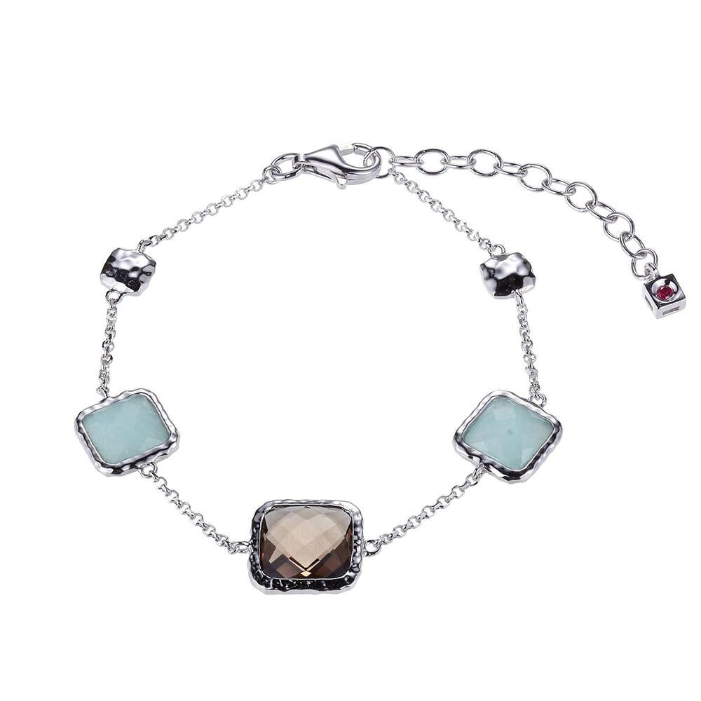 Elegant silver bracelet with blue and smoky quartz stones.