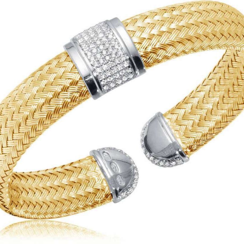 Elegant gold and silver woven bracelet with diamond accents.
