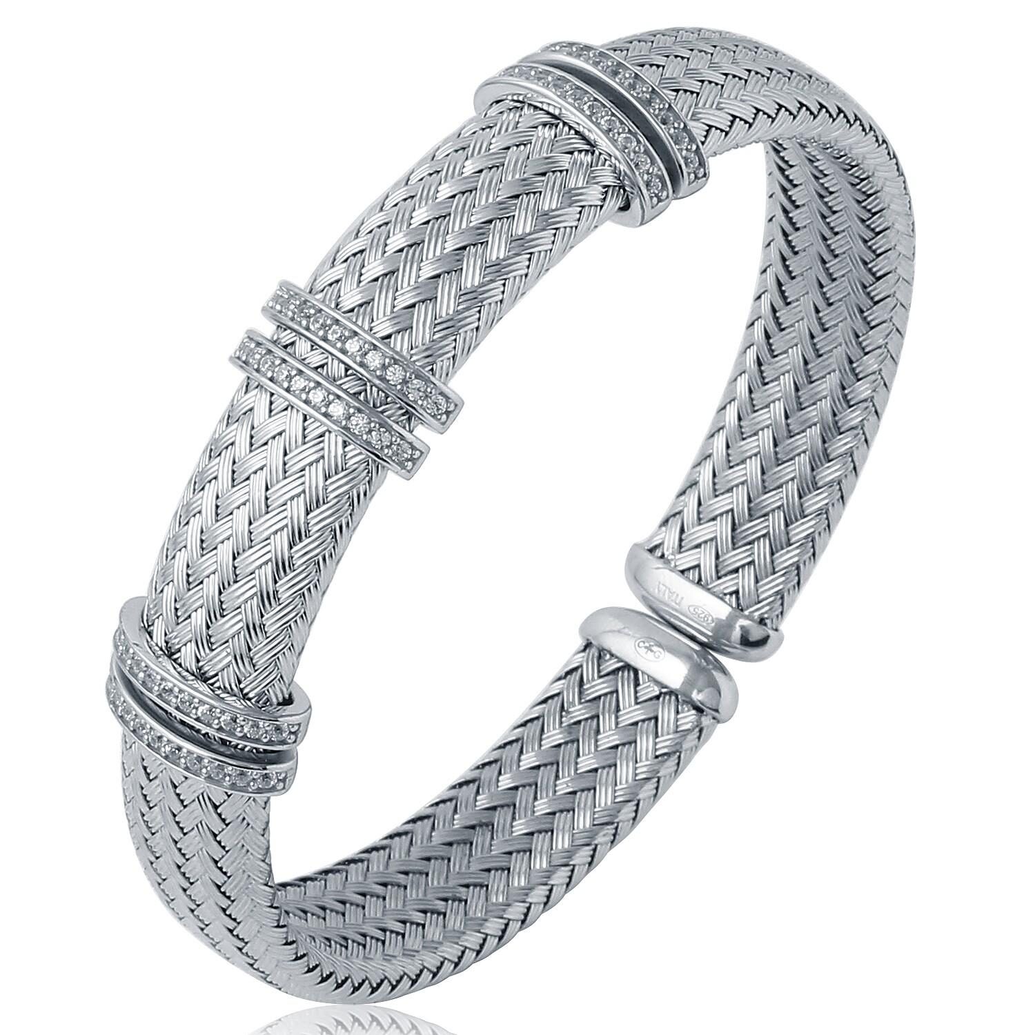 Elegant silver mesh bracelet with decorative clasps.