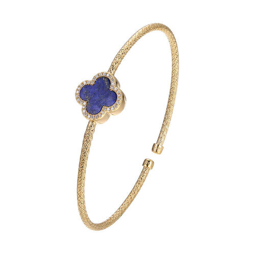 Elegant gold bracelet with a blue clover-shaped charm.