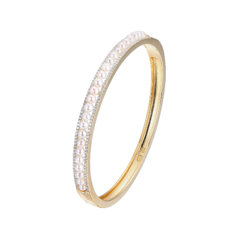 Elegant gold ring with a row of small diamonds.