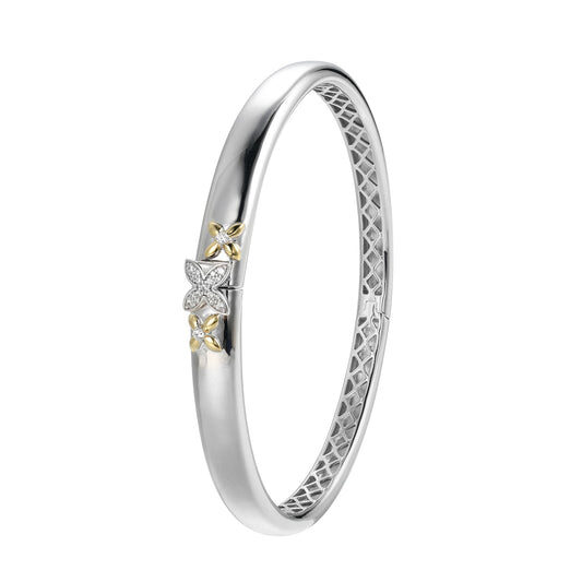 Elegant silver ring with a diamond centerpiece.