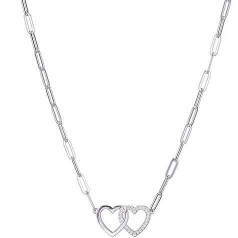Silver necklace with two intertwined heart pendants.