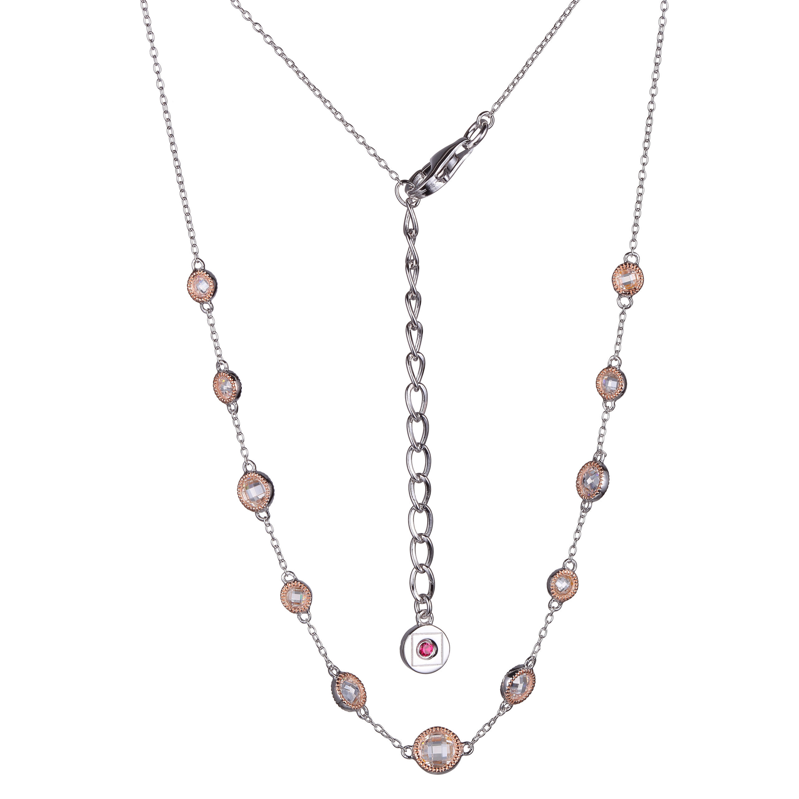 Delicate silver necklace with pink oval gemstones and adjustable chain.
