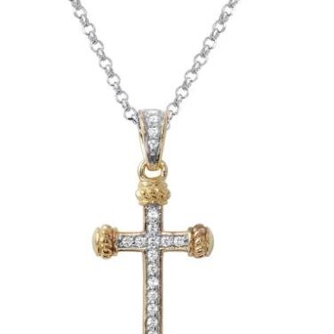 Elegant silver and gold cross pendant with embedded diamonds on a chain.