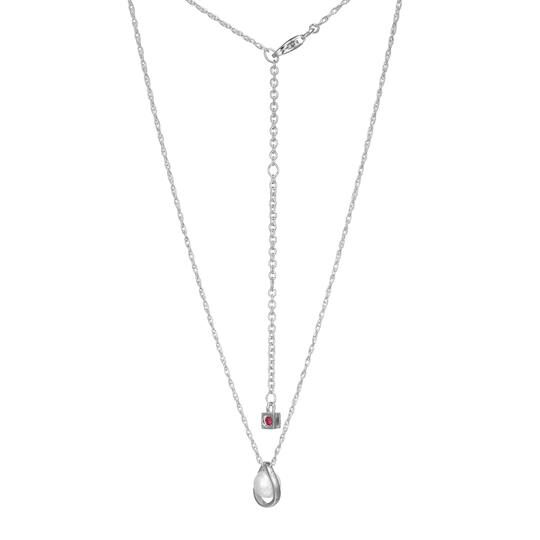 Elegant layered silver necklace with a teardrop pendant and small square charm.
