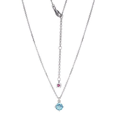 Delicate double-layer silver necklace with blue and pink gemstone pendants.