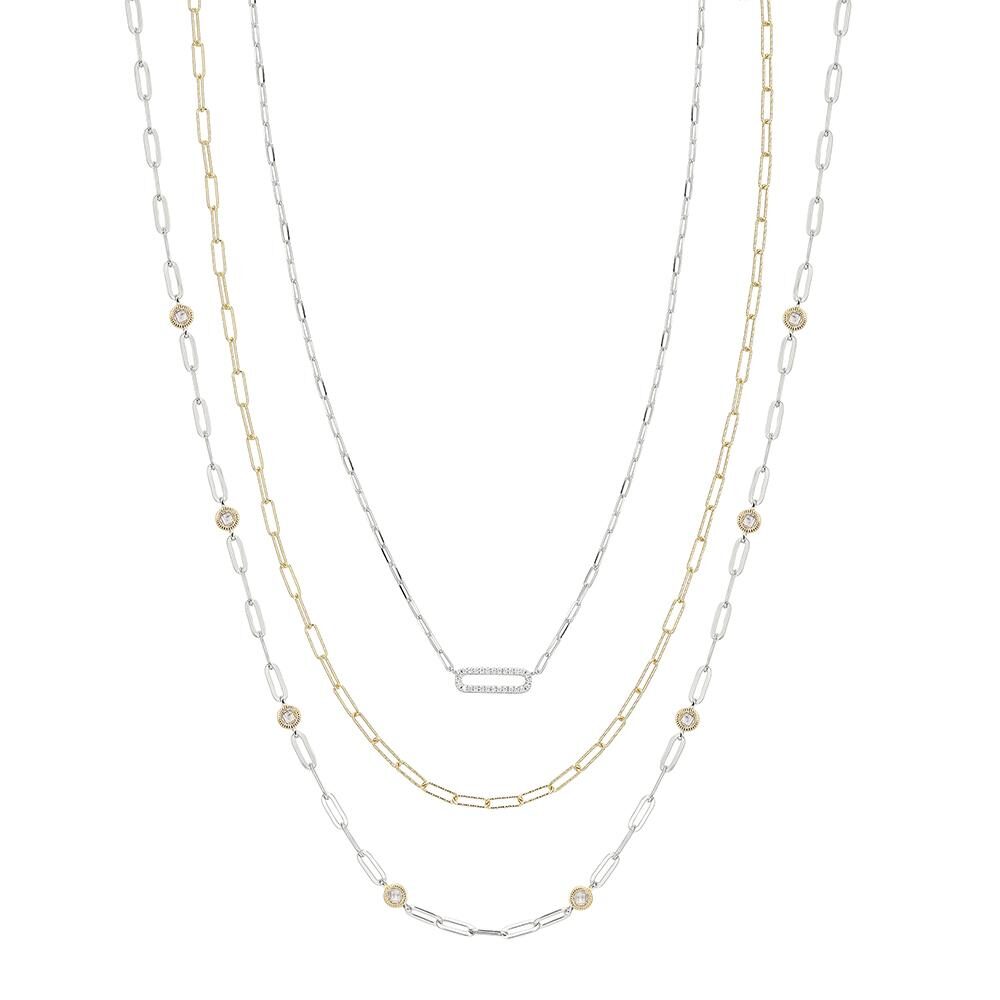 Three delicate layered silver necklaces with small beads and fine chains.