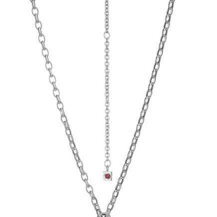 Elegant silver double chain necklace with a small pink gemstone.