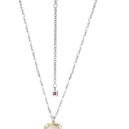 Elegant layered necklace with a pendant and a small pink charm.