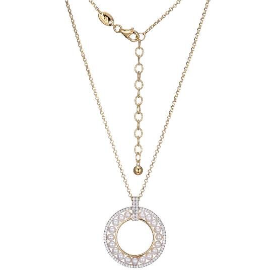 Elegant gold necklace with a circular pendant encrusted with crystals.