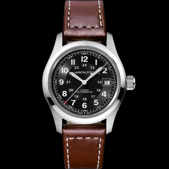 Classic wristwatch with black dial and brown leather strap.