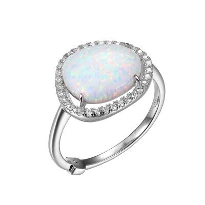 Elegant silver ring with a pear-shaped opal and diamond accents.