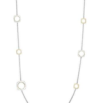 Delicate silver necklace with evenly spaced circular charms.