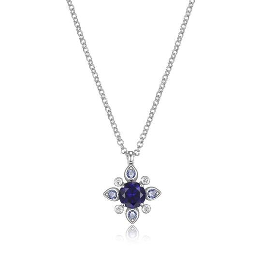 Elegant silver necklace with a dark blue gemstone flower pendant.