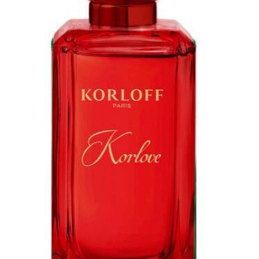 Red Korloff perfume bottle with elegant lettering.
