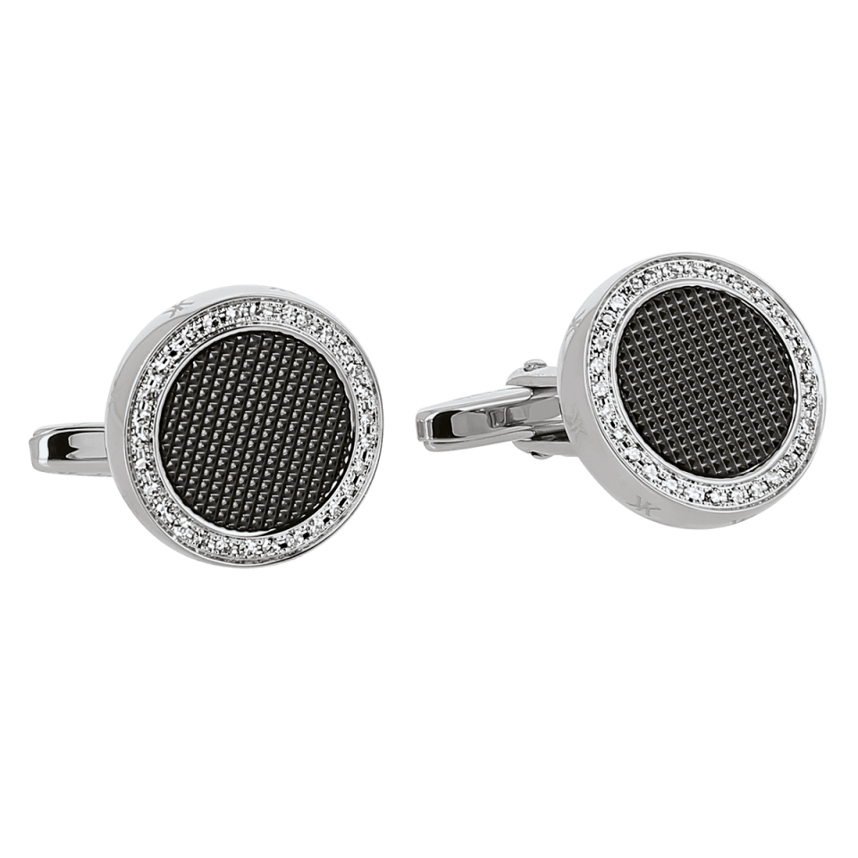 Elegant round silver cufflinks with a textured black center.