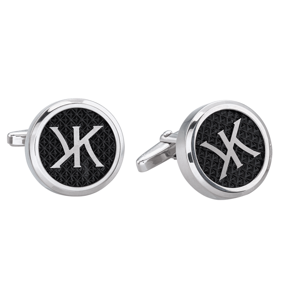 Round silver cufflinks with black center and white stylized logo.