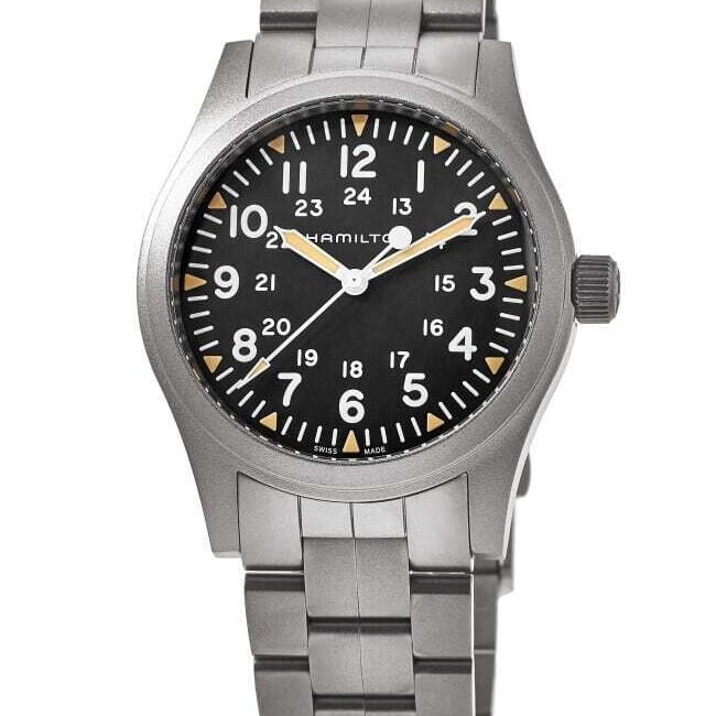 Stainless steel wristwatch with black dial and white numerals.
